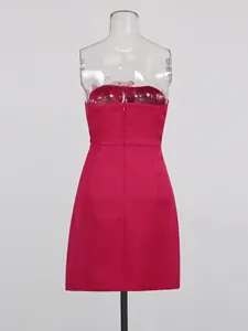 Elegant fuchsia strapless cocktail mini dress back view on clear display mannequin