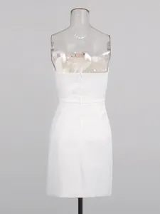 Elegant white strapless mini dress featuring exquisite floral embroidery and back zipper.