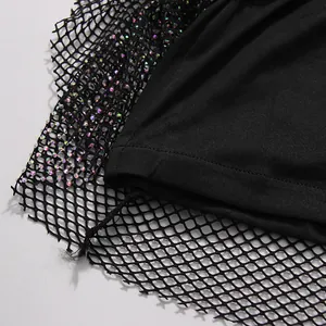 Close-up of black mesh fabric with sparkling sequins for a stylish socialite dress set