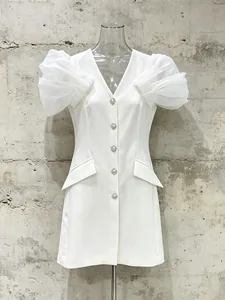 Elegant white V-neck mini dress with sheer puff sleeves and rhinestone button details.