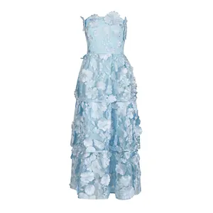 Front view of an elegant light blue strapless maxi dress with 3D floral applique