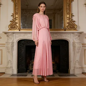 Detailed view of an elegant pink pleated long sleeve maxi dress with round neck