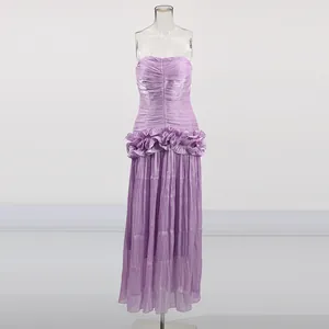 Elegant lavender strapless maxi dress featuring stylish waist ruffles and a classic pleated skirt