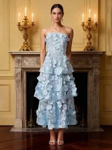 Elegant strapless light blue midi dress with 3D floral embroidery and tiered skirt.