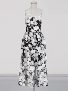 Elegant strapless maxi dress with white 3D floral embroidery on black lace overlay
