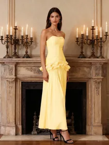 Elegant yellow strapless maxi dress featuring a ruffled waist design for formal evening events