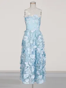 Elegant light blue strapless maxi dress featuring intricate 3D floral embroidery applique