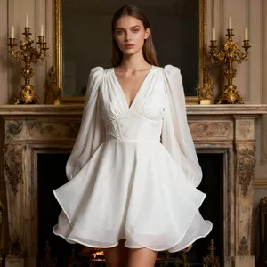 Detailed shot of white V-neck mesh dress with puff sleeves and corset waist design