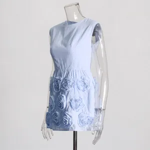 Detail view of the intricate 3D floral appliqués on this vintage-inspired striped mini dress