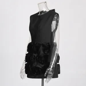 Side view of French retro black slim dress featuring 3D floral roses on the skirt