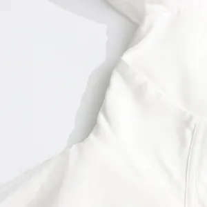 Close-up view showing the elegant corset fishbone waist design on this white mesh dress