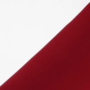 Close-up macro detail of premium burgundy coat fabric texture