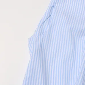 Close-up of high-quality blue and white striped fabric for a French vintage style dress.