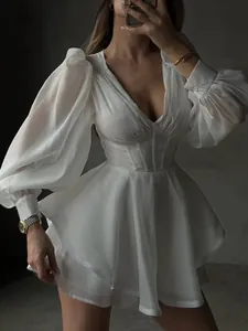 Elegant white V-neck mesh mini dress with puff sleeves and corset boning waist