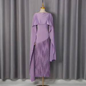 Detailed view of elegant purple slim-fit dress with shawl design and fringe