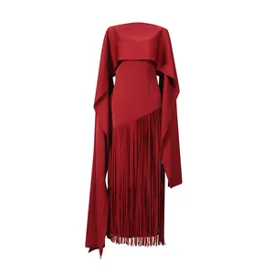 Elegant red slim-fit dress featuring a unique cape design and delicate fringe hem detail.