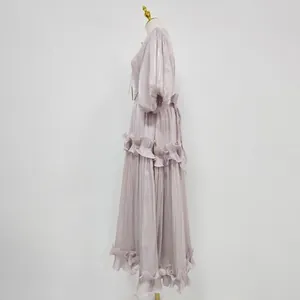 Side view of French elegant lavender puff sleeve long dress with ruffle tiered skirt design