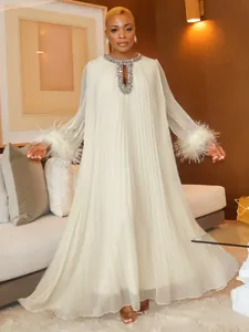 Elegant plus size cream pleated maxi dress with rhinestone neck and ostrich feather cuffs
