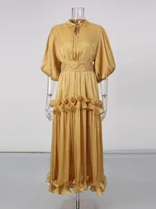 Elegant French style gold long dress with puff sleeves and ruffled tiers for women