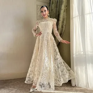 Full view of elegant beige lace dress with intricate floral embroidery and long sleeves