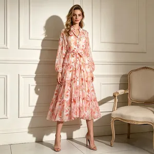 Full-length view of romantic floral shirt dress with lantern sleeves and belted waist