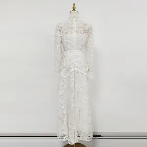 Rear view of white water-soluble lace evening dress with intricate floral embroidery