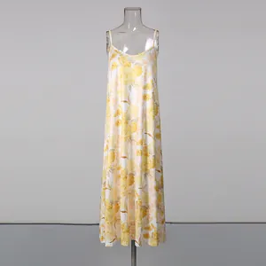 Pastoral yellow floral print maxi slip dress with V-neck on transparent mannequin