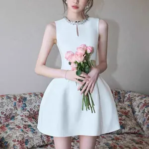 Premium elegant white sleeveless mini dress with crystal collar and keyhole neckline detail