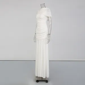 Elegant white ruched sleeveless long dress with pleated detail shown from a side angle