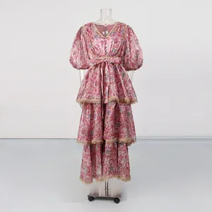 Vintage floral tiered maxi dress with elegant V-neck, lace trim, and waist tie detail
