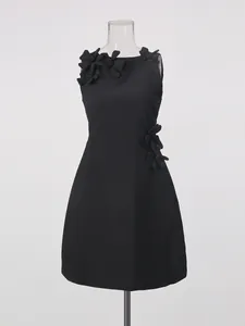 Elegant black sleeveless mini dress featuring 3D floral applique for a sophisticated look