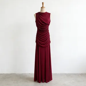 Elegant sleeveless ruched long dress in deep burgundy featuring French style design