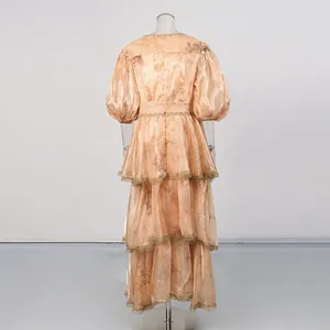 Back view of a retro tiered floral maxi dress with elegant lace trim details