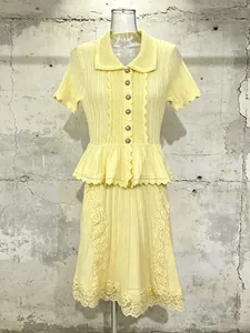 Sweet yellow knit dress with lapel collar, ruffles, and lace embroidery detail