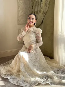 Elegant French style cream lace long-sleeved evening gown with intricate water-soluble embroidery