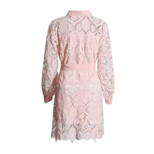 Back view of pink French style lace dress with heavy embroidery and hollow-out design