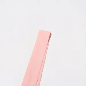 Detailed view of a light pink fabric strap for a French style elegant dress