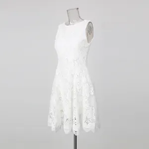 Elegant white sleeveless lace embroidery dress with a round neck and detailed floral patterns