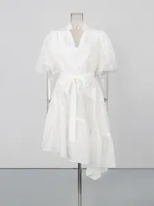 Elegant white V-neck tea-break dress with lace puffy sleeves and a unique irregular hemline