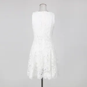 Back view of elegant white sleeveless dress with intricate floral lace embroidery