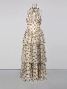 Vintage polka dot halter dress with tiered mesh skirt and deep V-neck for banquets.