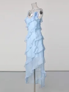 Elegant light blue ruffled slip dress with asymmetric hem for vacation and evening parties.