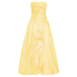 Elegant yellow strapless evening gown with 3D floral appliqués and ruffled long skirt.