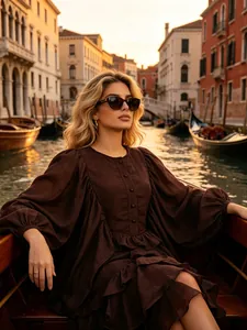 Elegant brown palace style dress with lantern sleeves and ruffles in Venice sunset