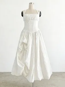 Elegant French style white sleeveless halter dress with corset waist and full skirt