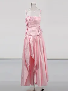 Elegant pink strapless maxi dress with 3D floral appliqués and pleated high-low skirt