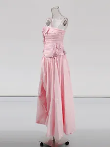 Elegant pink strapless evening gown with 3D floral appliqués and high side split
