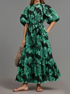 Elegant green floral print maxi dress with puff sleeves and waist tie belt detail
