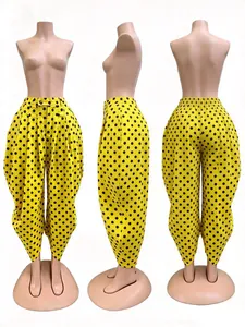 Stylish yellow high-waisted harem pants with black polka dots shown from three angles