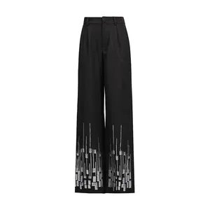 High-waisted black wide-leg trousers with elegant silver sequin geometric embroidery